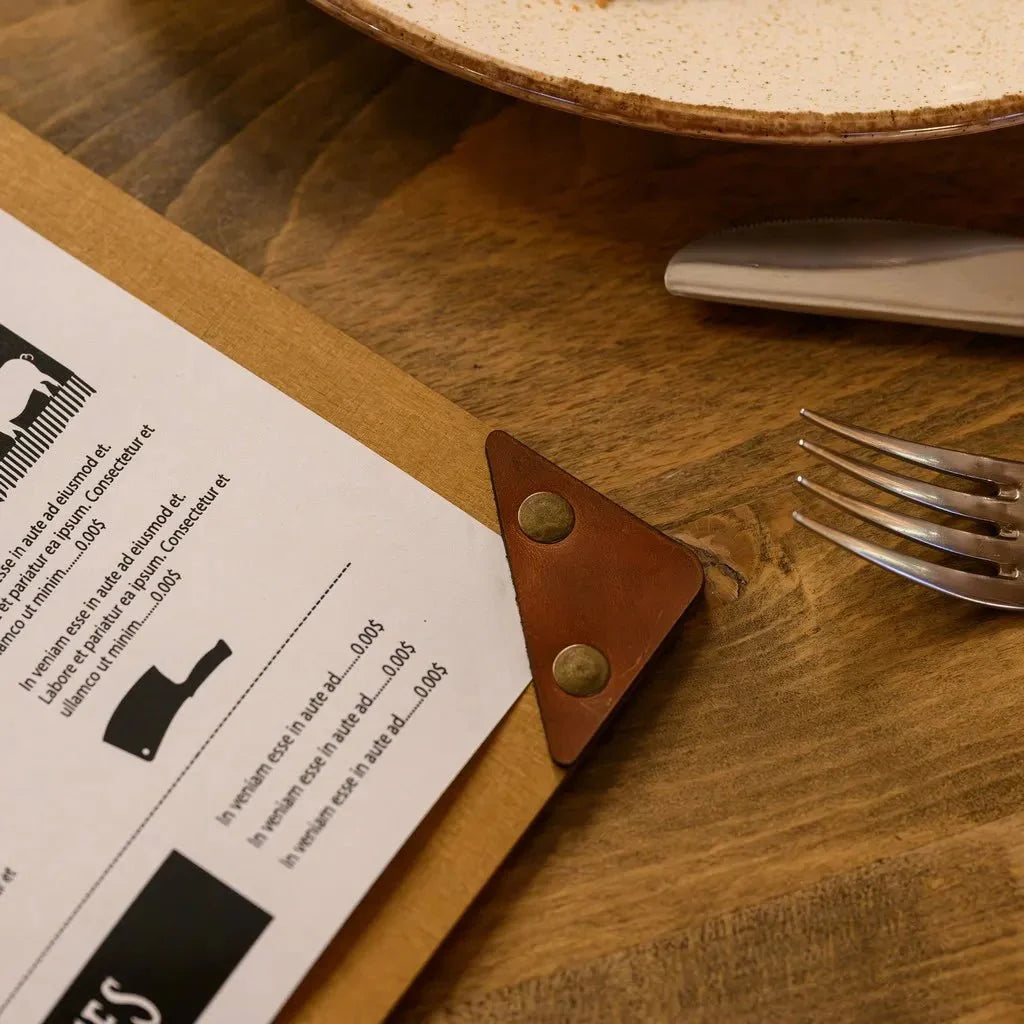 Elegant menu booklet crafted from natural wood.
