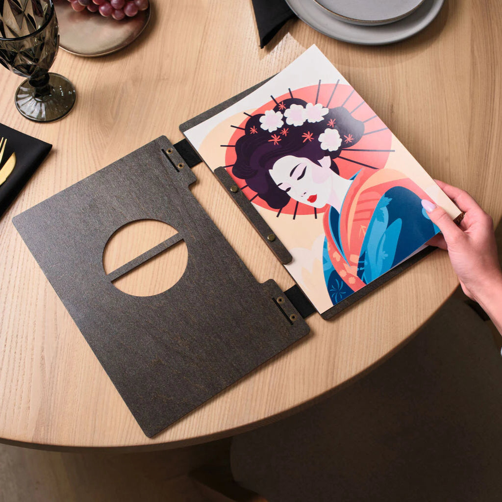 An open wooden menu displaying a vibrant, full-page illustration of a Japanese geisha, secured by a matching wooden spine strip with brass rivets.