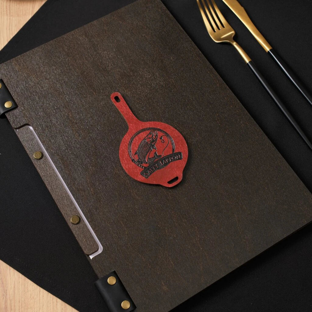 Overhead view of the folder featuring the customized leather pan insert.