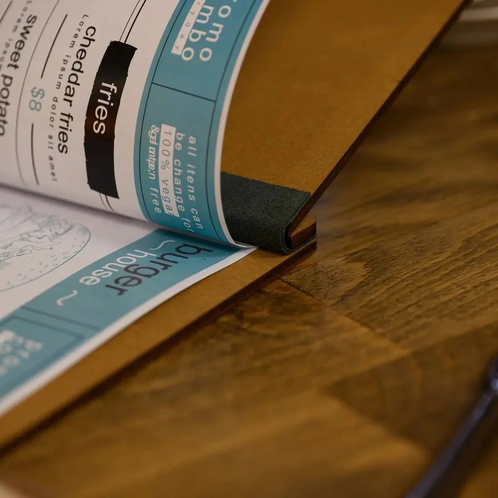 Protective covers restaurant menu for long-lasting use.