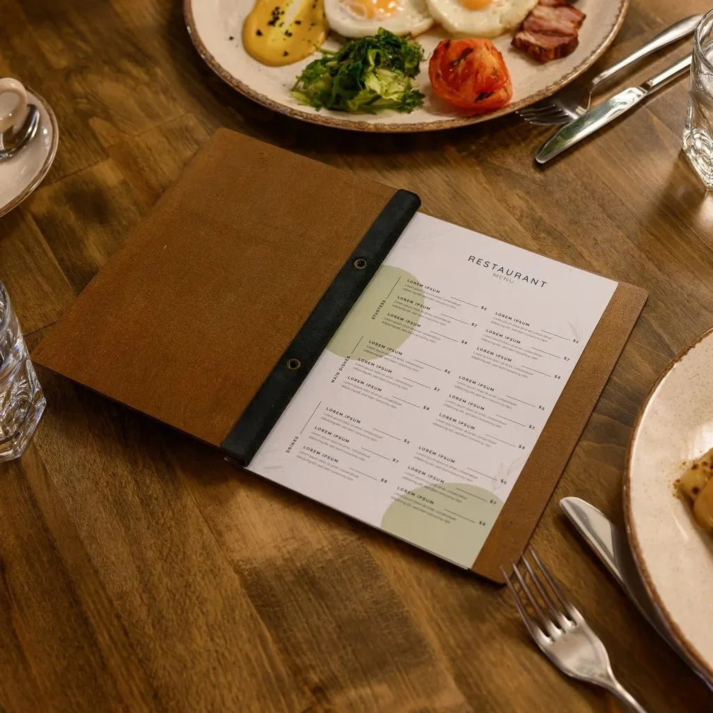 Personalized menu books for restaurants with custom engraving.