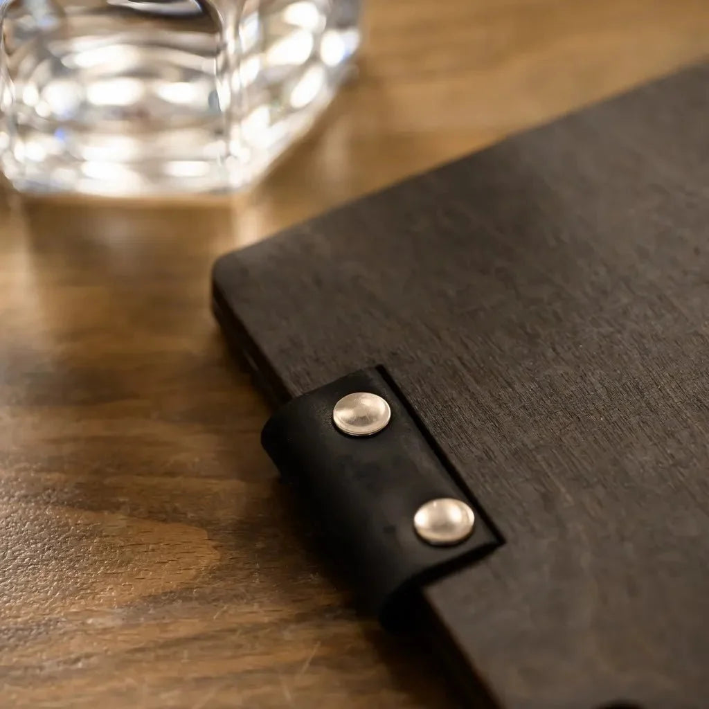 Premium restaurant menu cover with a sleek leather finish.