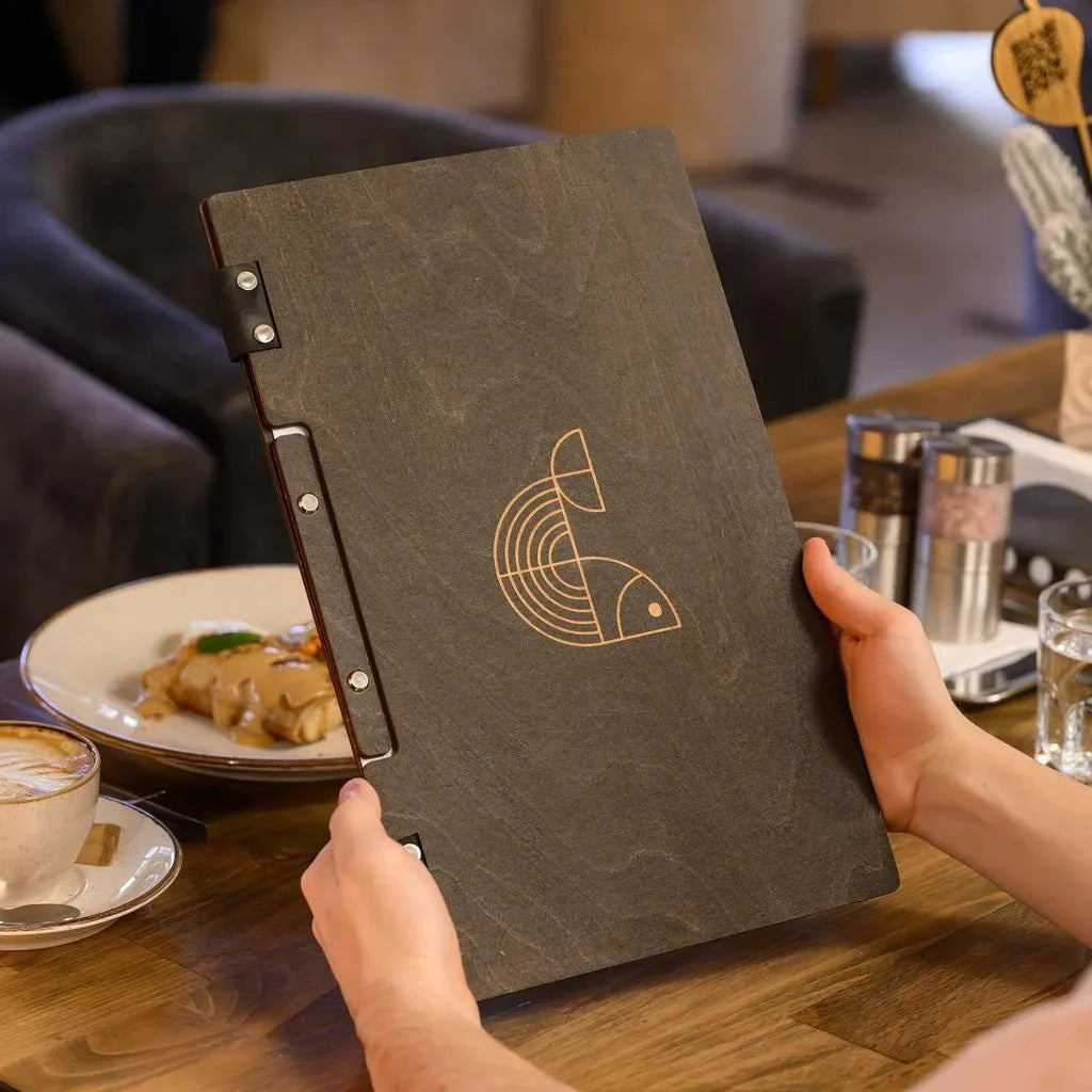Bespoke restaurant menu books with custom branding.