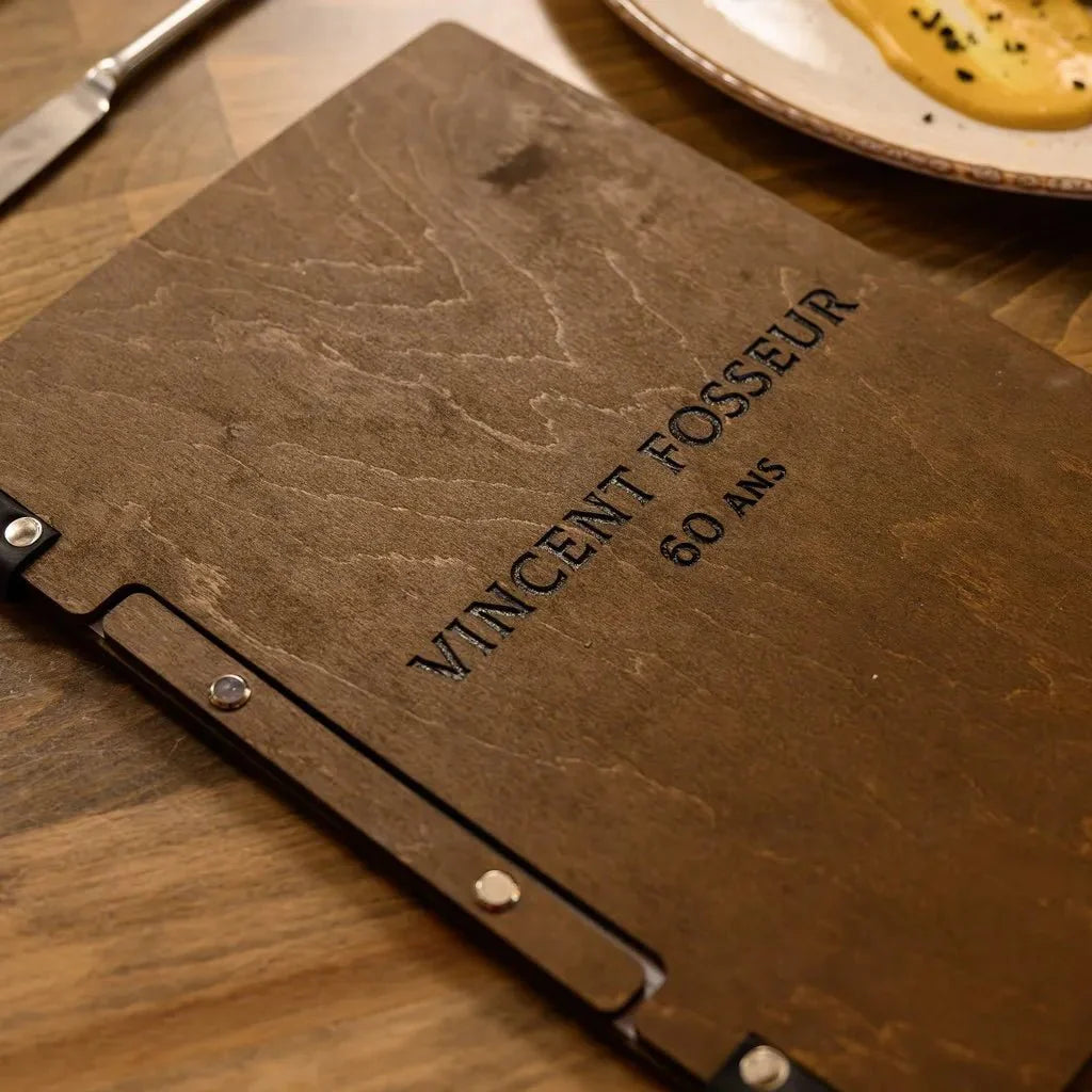 Customizable restaurant menu cover with logo branding.