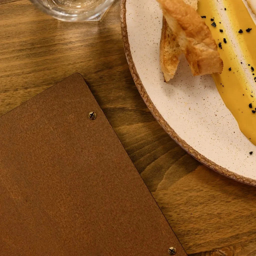Refined menu cover with elegant wood craftsmanship.