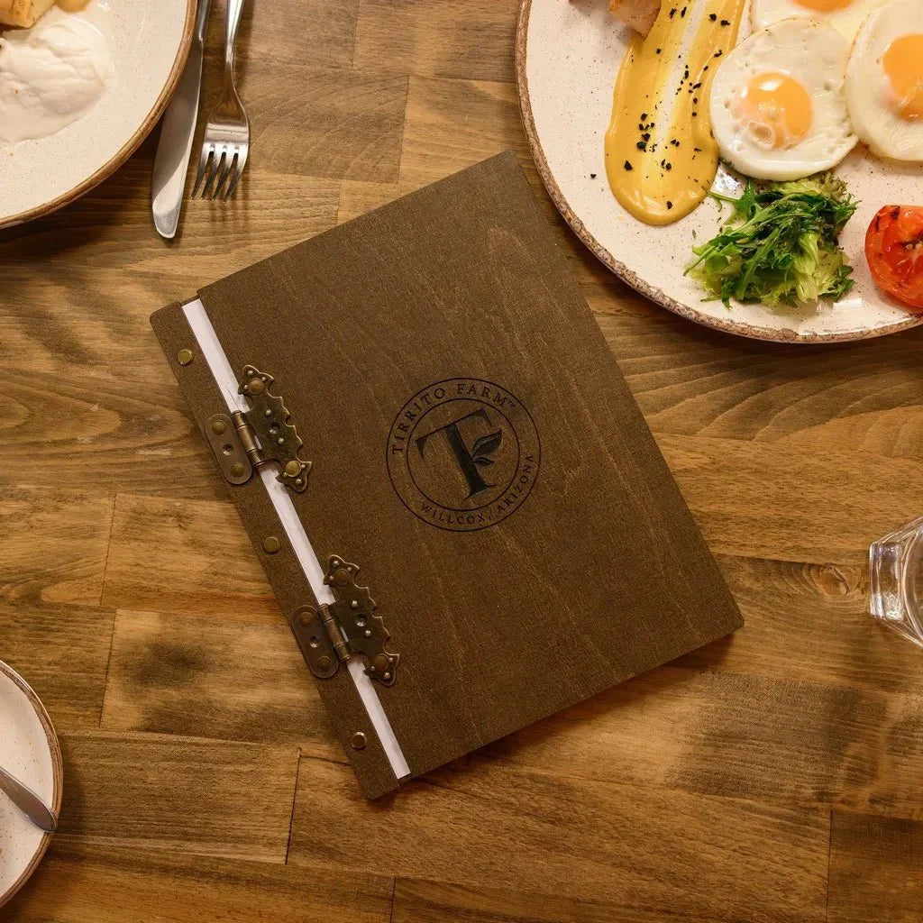 Rustic menu booklet with vintage wood detailing.
