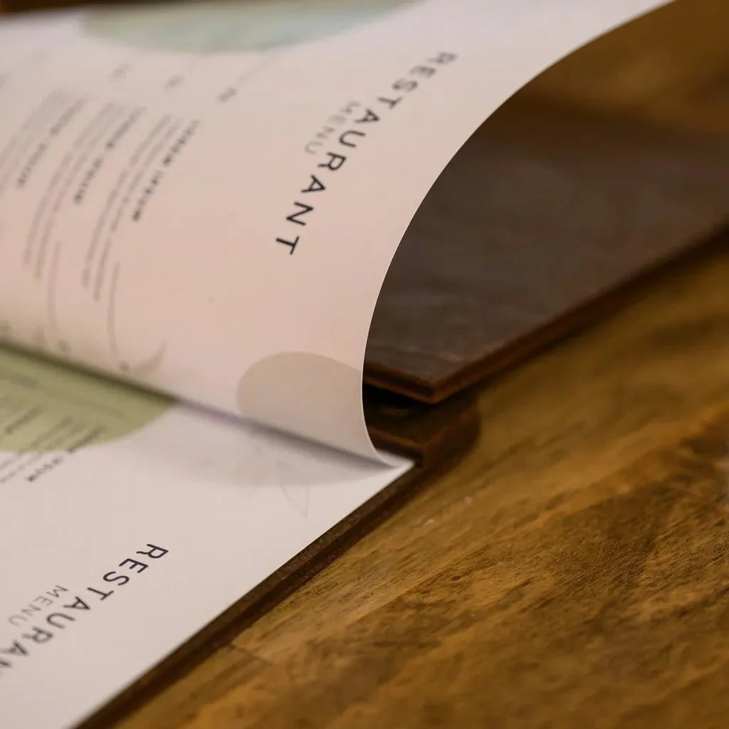 Personalized custom menu covers for brand identity.