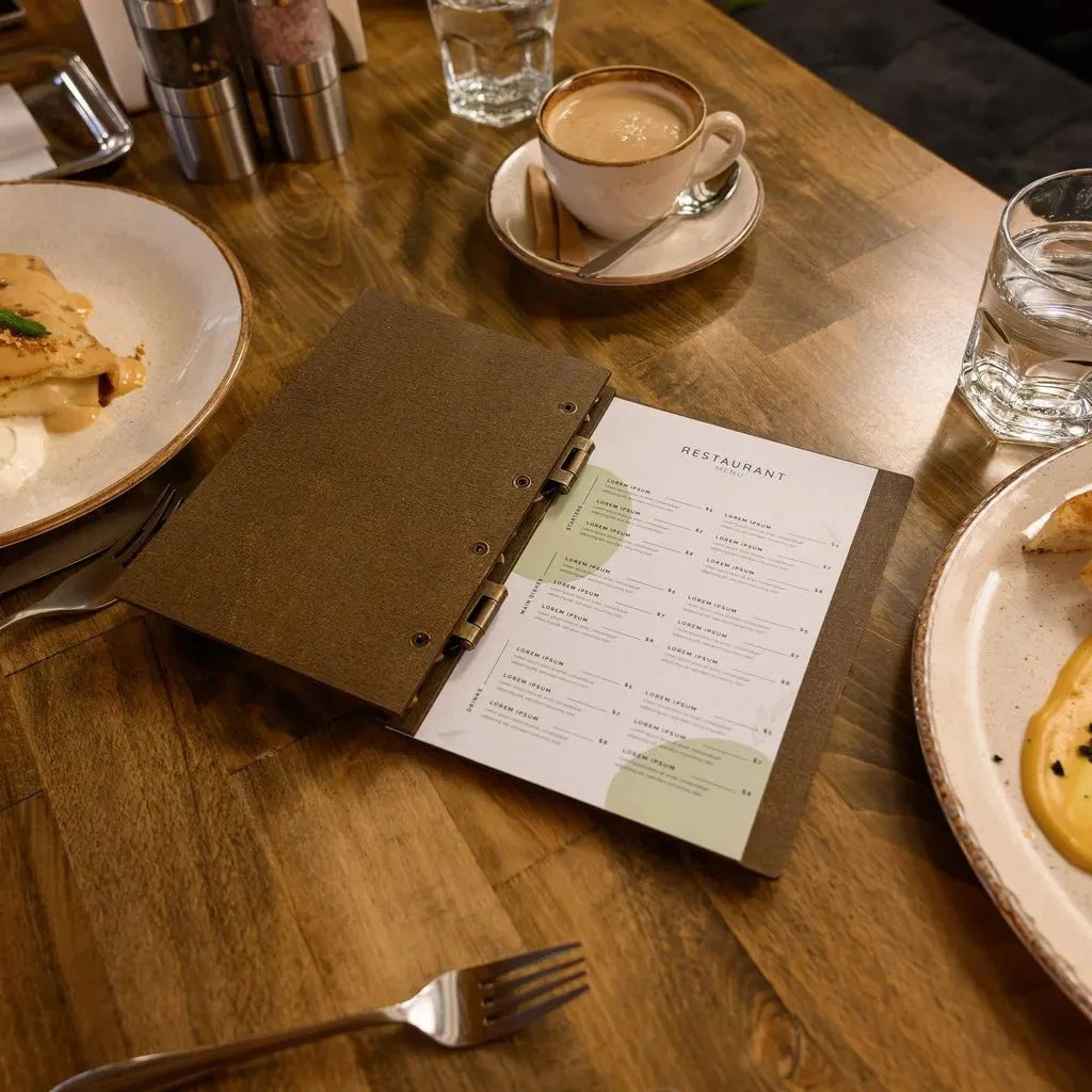 Elegant menu book with metal corner reinforcements.