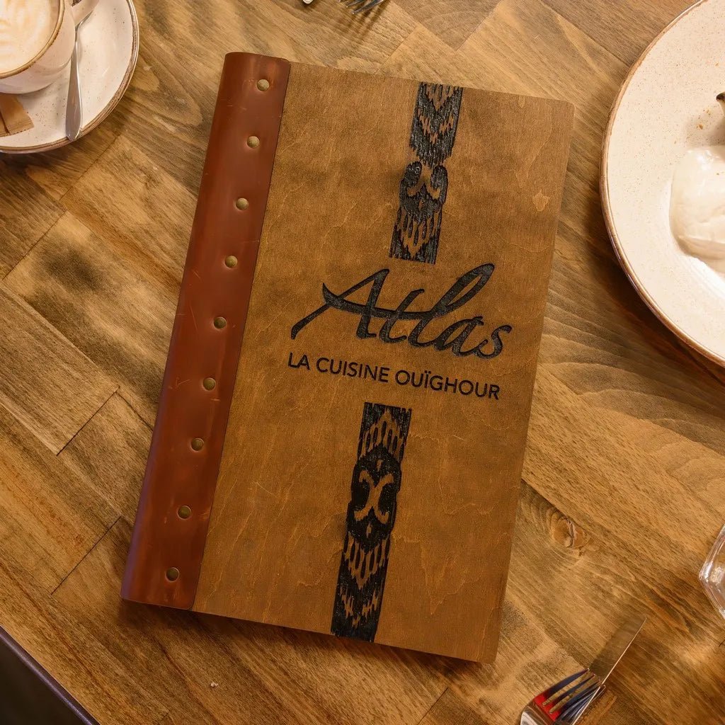 Protective menu sleeves for restaurants with reinforced edges.