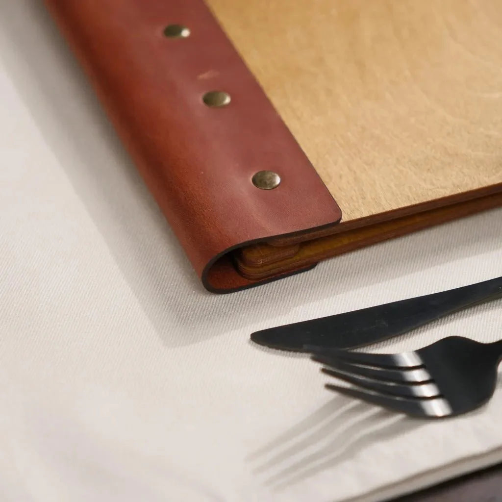 Elegant restaurant menu cover with a luxury aesthetic.