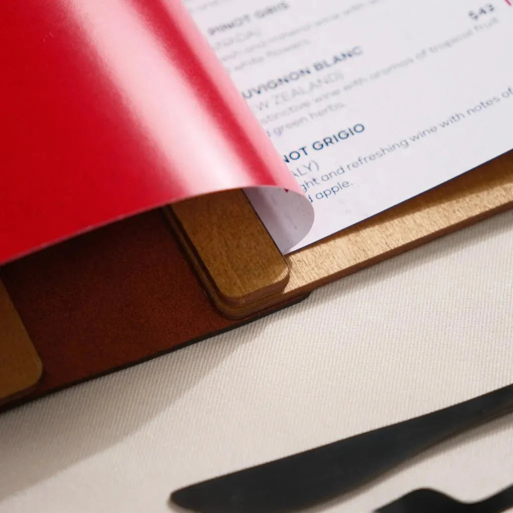 Custom menu covers for restaurants with logo engraving.