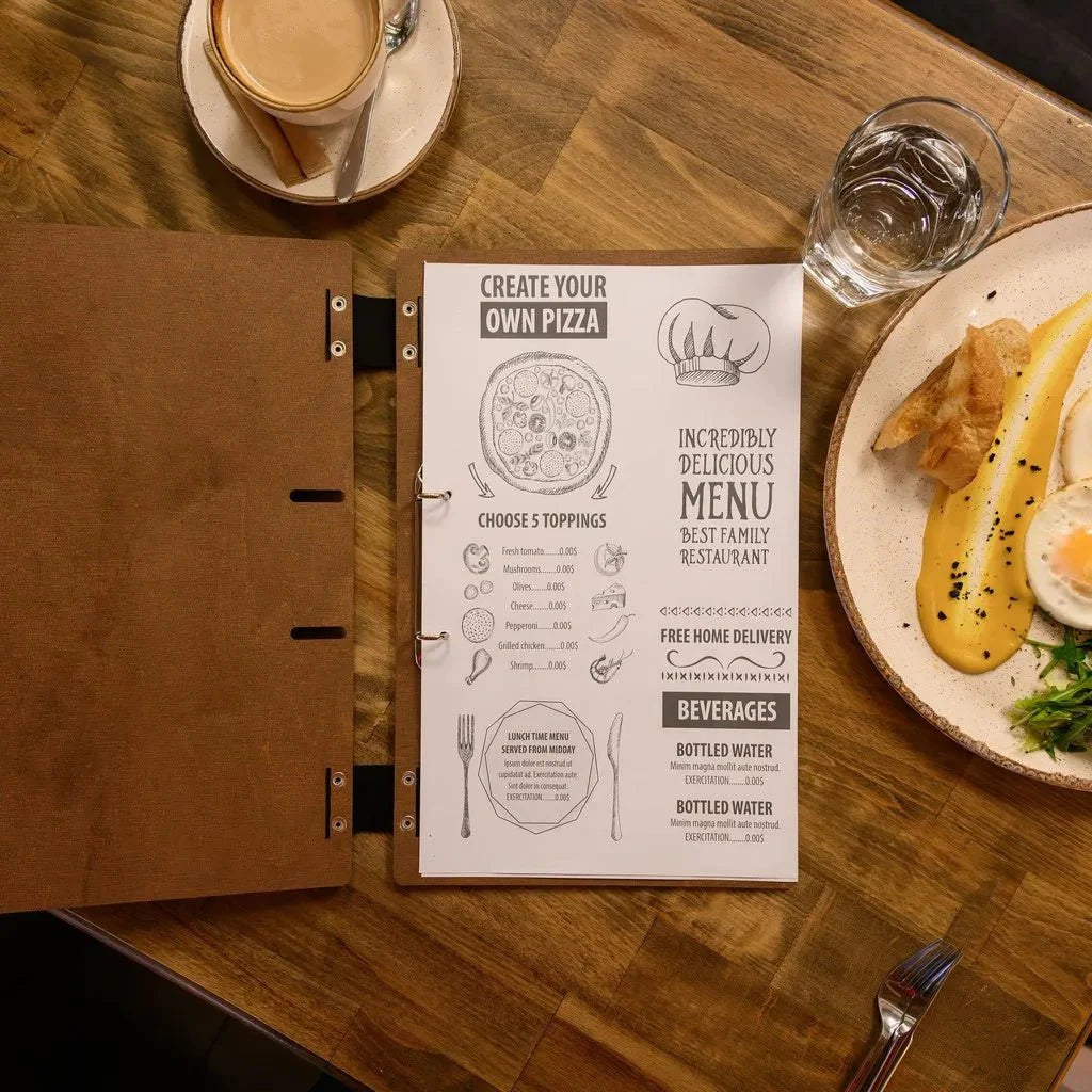 Handcrafted menu covers restaurant with premium materials.
