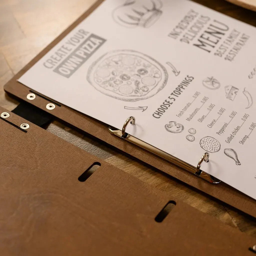 Custom restaurant menu books designed for fine dining.