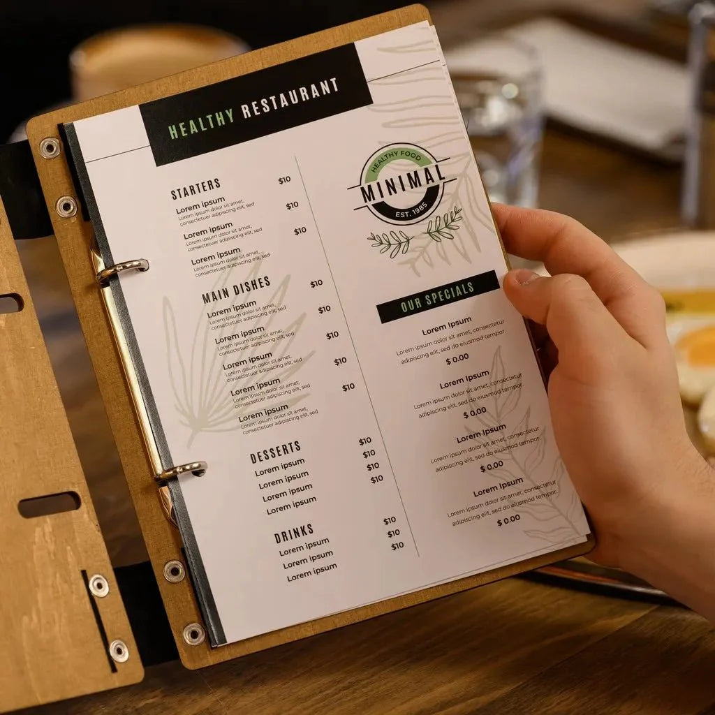 Engraved menu book with a unique wood grain pattern.