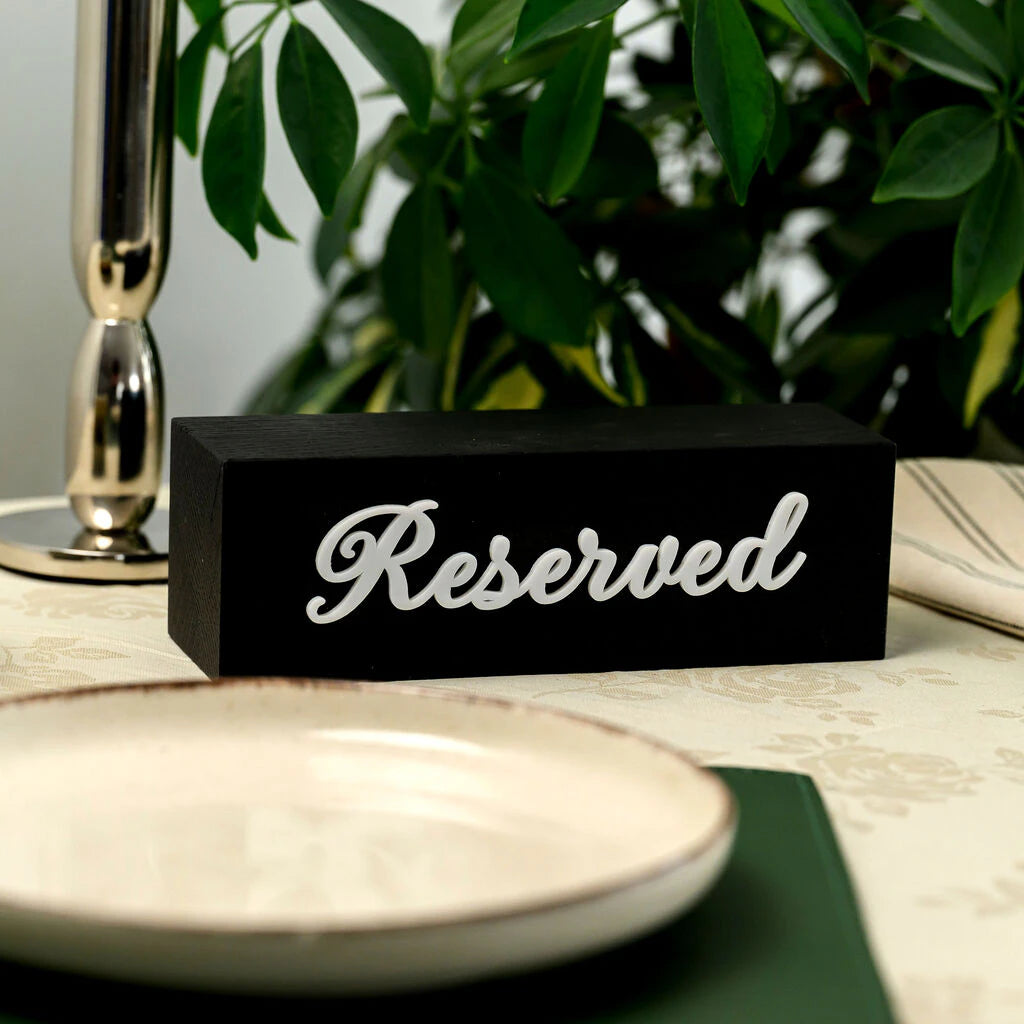 Premium black oak reservation block with white cursive "Reserved" lettering