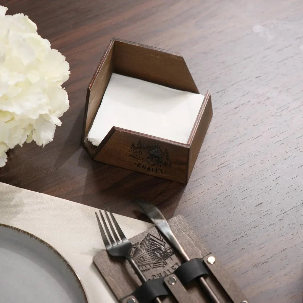 Compact wood napkin case for neat storage.