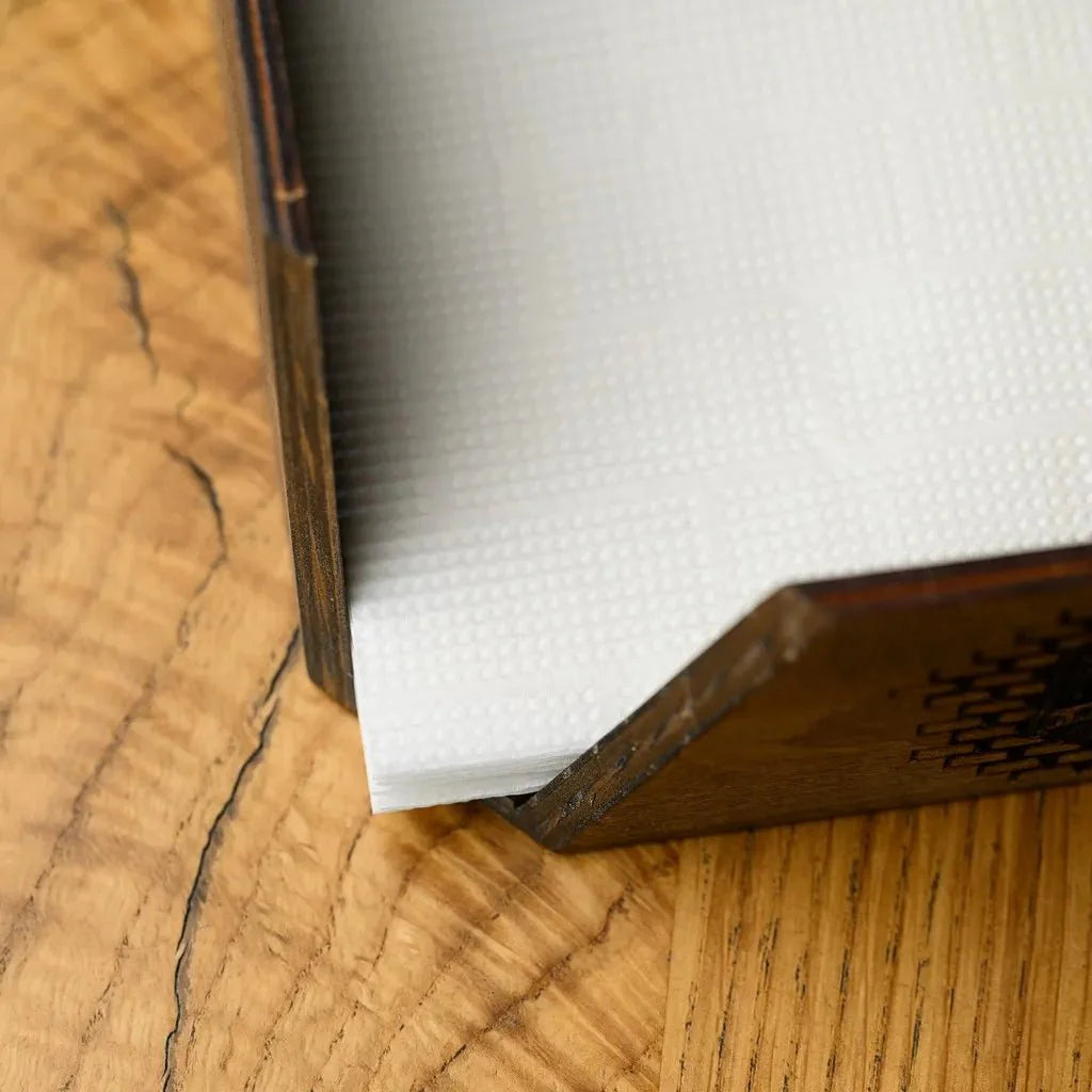 Stylish engraved napkin holder made from natural wood.