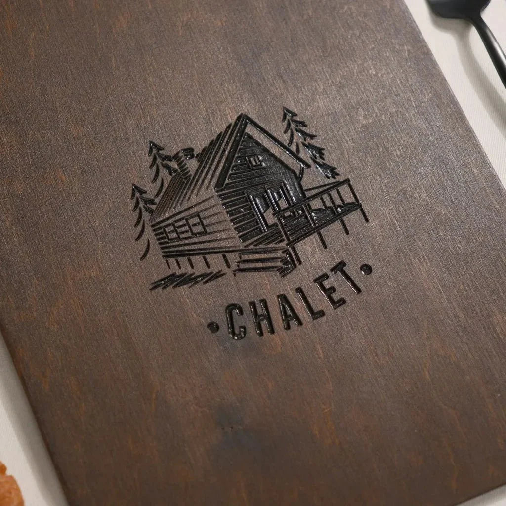 Customizable engraved wood menu book with brand details.