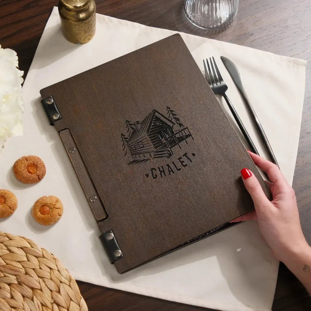 High-quality engraved wooden menu book with a refined finish.
