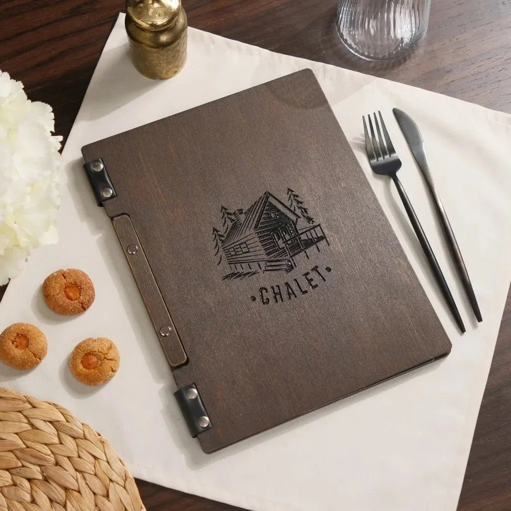 Rustic custom wood menu cover with deep engraving.