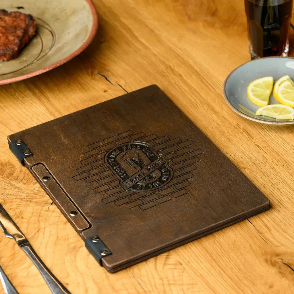 Functional menu covers restaurant with a rich wood texture.