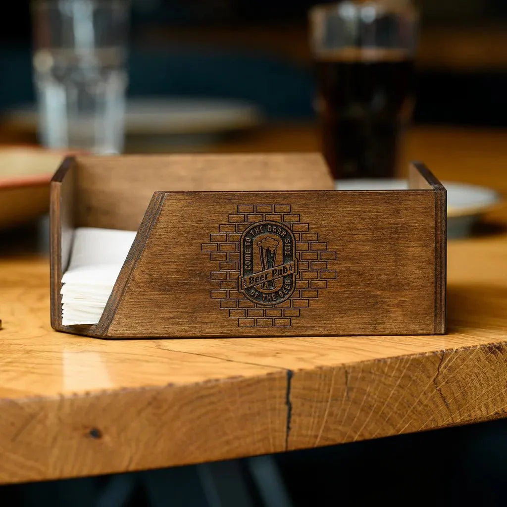 Modern wood napkin holder with precision engraving.