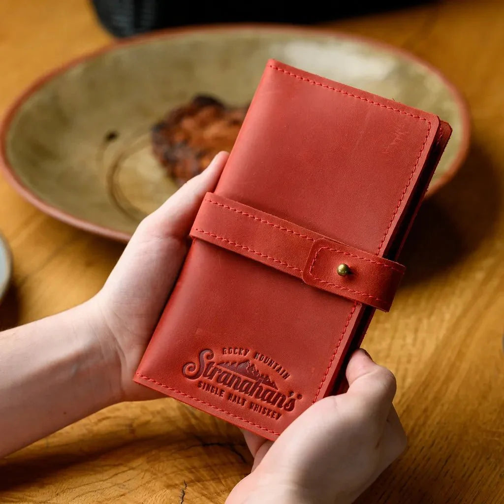 Compact and stylish waiter’s notebook made from Crazy Horse leather, designed with a secure closure to help keep essential notes safe.