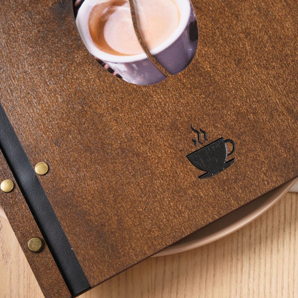 Close-up of brass screw fasteners and laser-engraved topographic lines on a wooden menu cover.