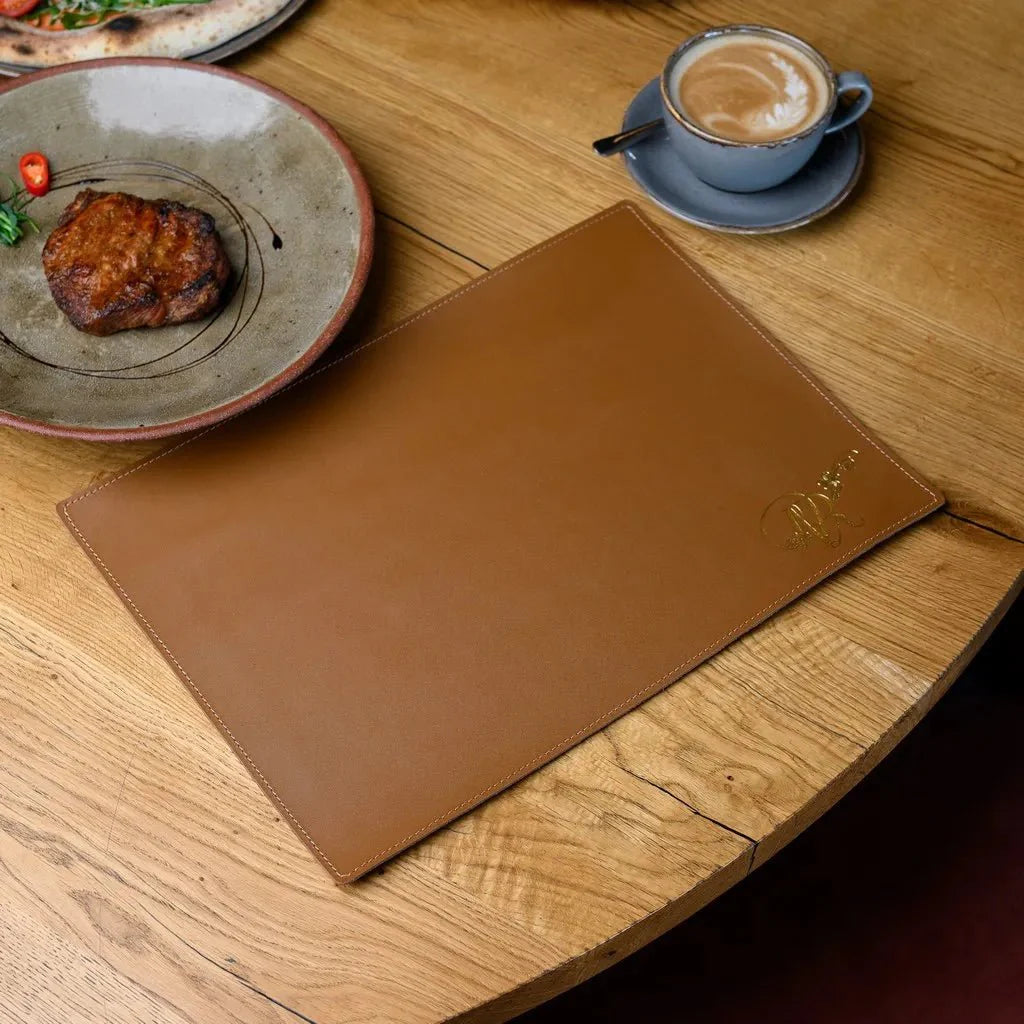 High-quality rectangular leather placemat for dining and office use.