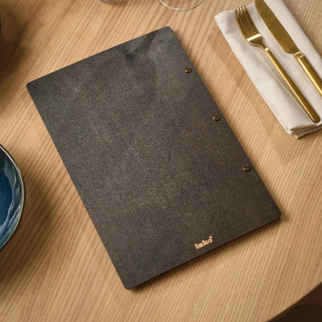 Back view of a premium wooden menu board in a dark Jeans wood finish, featuring a small "inko" gold foil logo and antique brass hardware