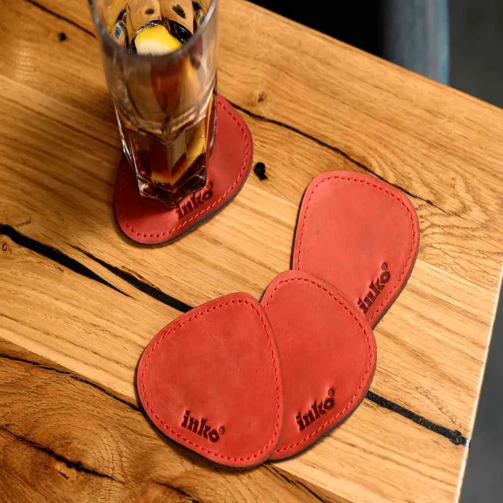 Шкіряні підставки Crazy Horse у формі краплі, що захищають поверхню столу