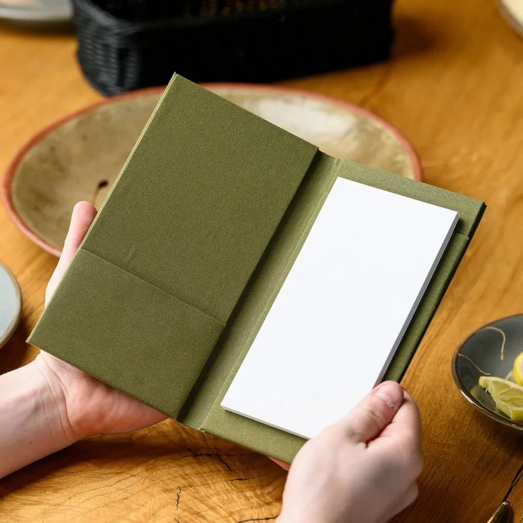 Professional Textile Notebook for Waiters, with a durable fabric cover for long-lasting use. The ideal size for carrying orders, notes, and other essential information during shifts.