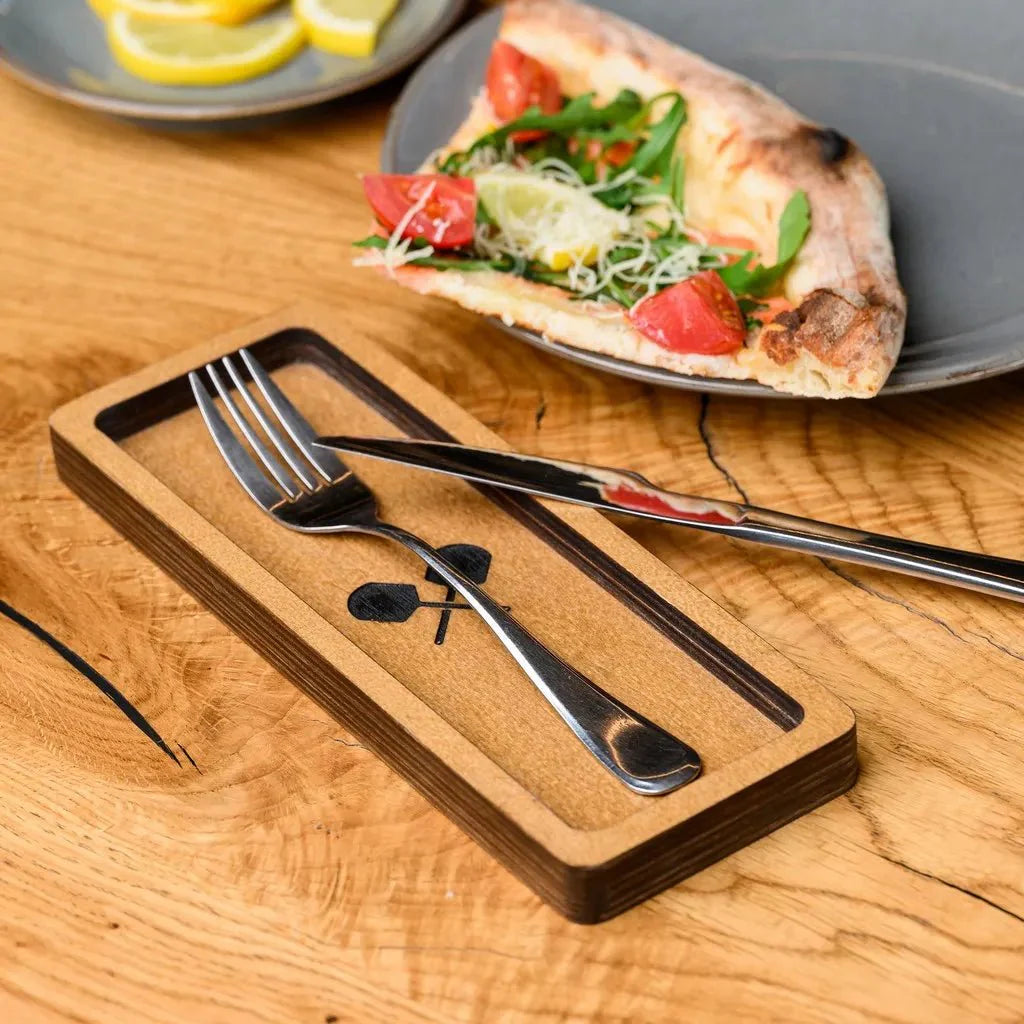 Elegant wooden cutlery holder with multiple compartments.