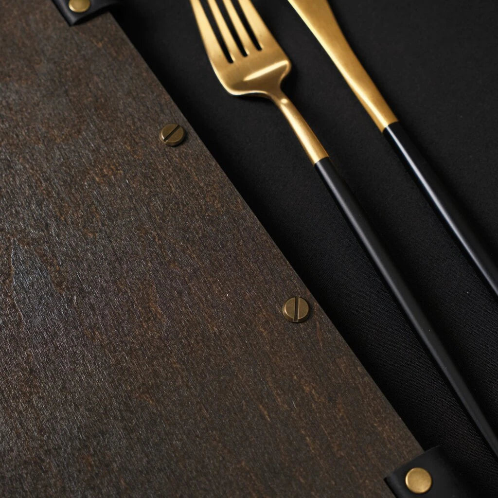 Close-up of the brass screws used for the folder's binding.