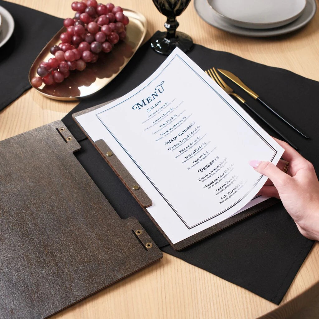 Wider angle showing the open folder with a full view of the menu categories.