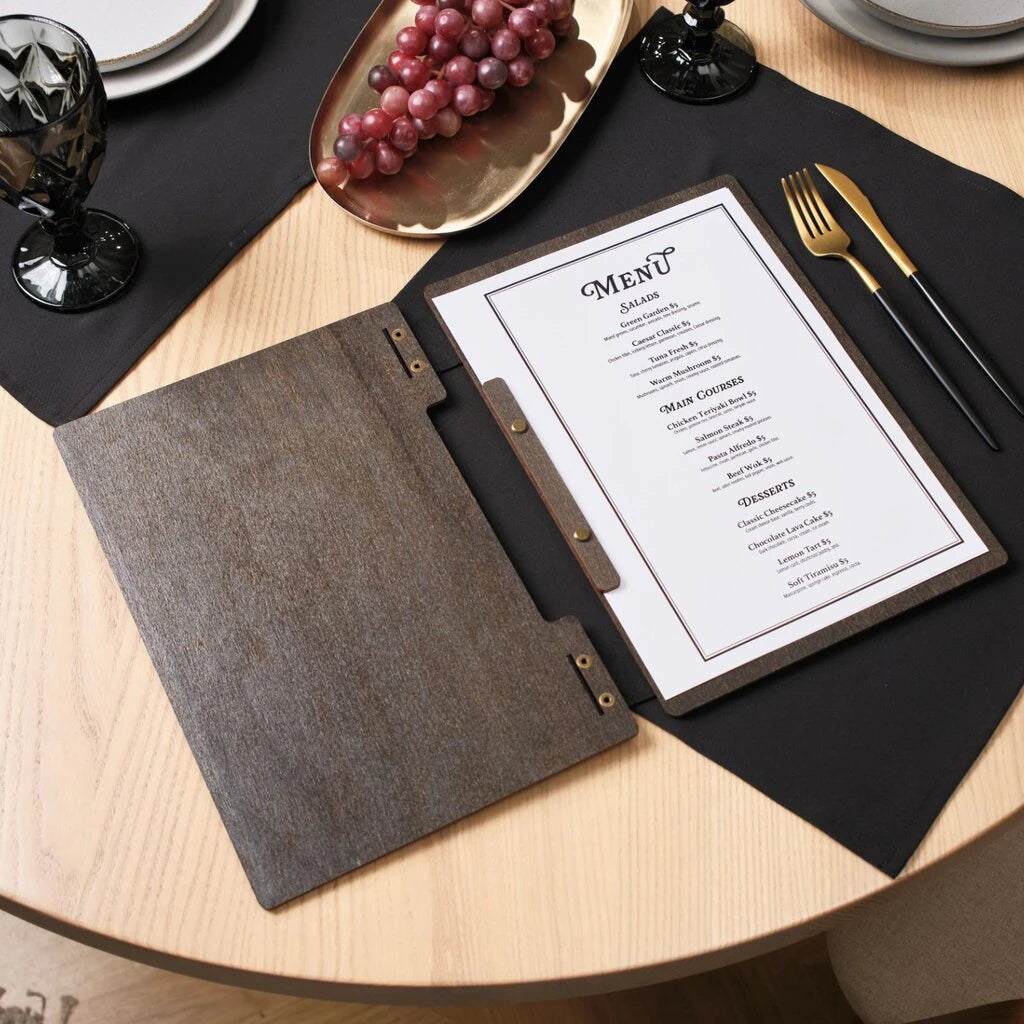 An open wenge-colored menu folder, showcasing the interior with a white menu sheet and the elegant texture of dark wood