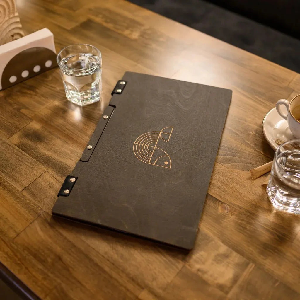 Modern covers restaurant menu with durable binding.