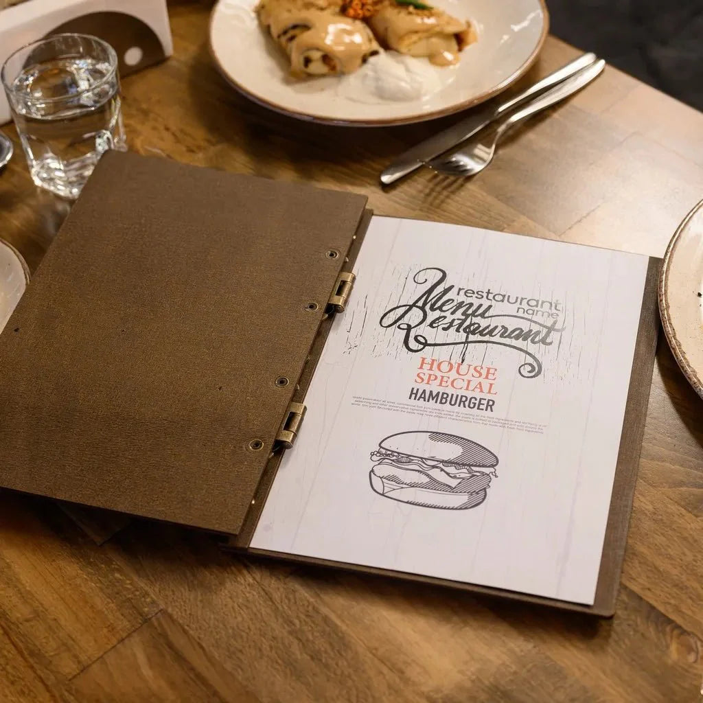 Bespoke menu book crafted from fine wood.