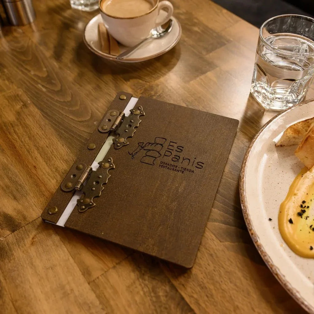 Natural wood menu cover with a smooth finish.