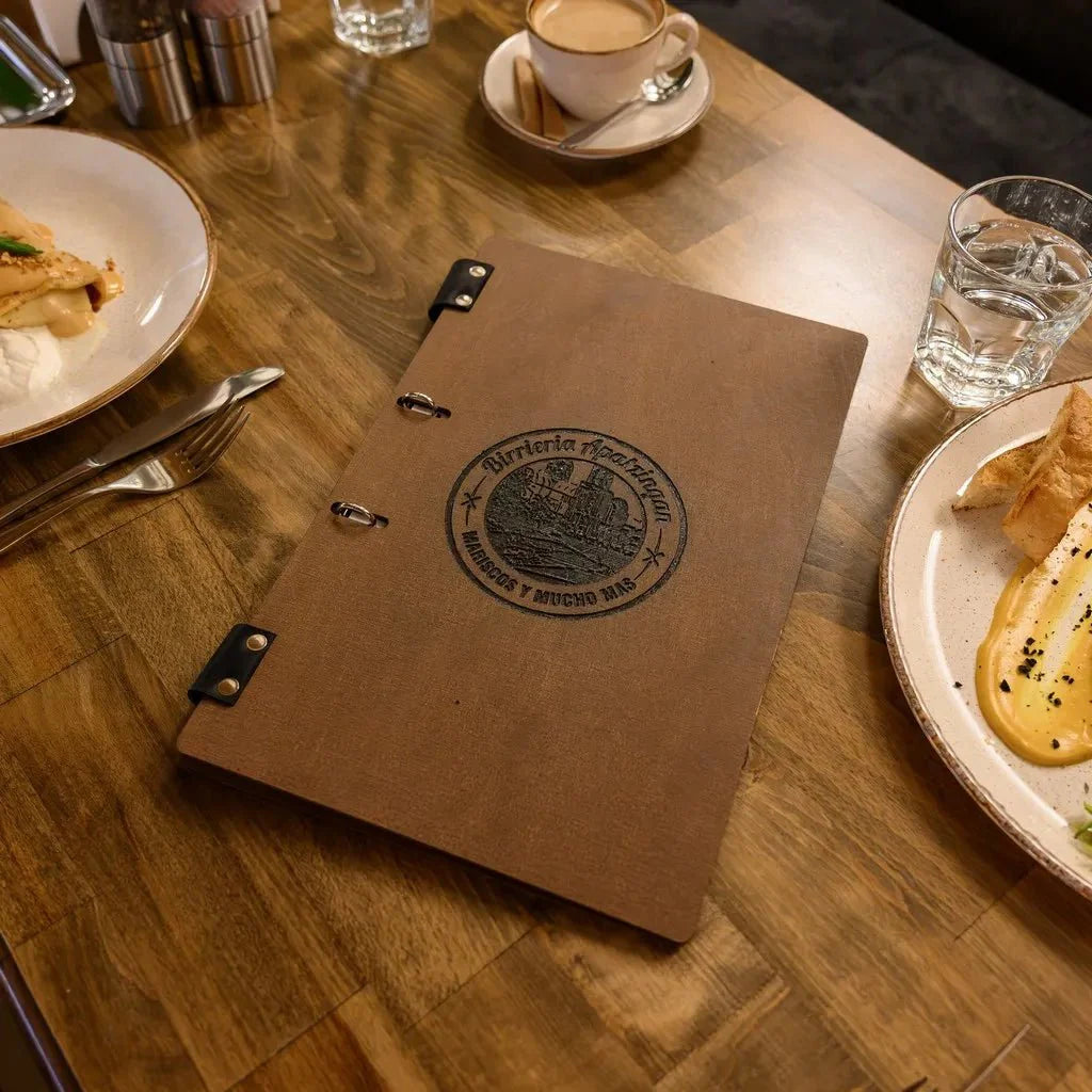 Transparent restaurant menu sleeves for easy updates.